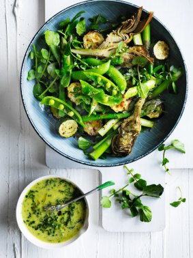Spring green salad with cucumber and dill dressing.