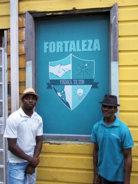 Jafet and Santiago in front of Fortaleza's logo.