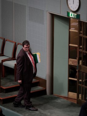 Nationals MP George Christensen departs after question time on Monday.