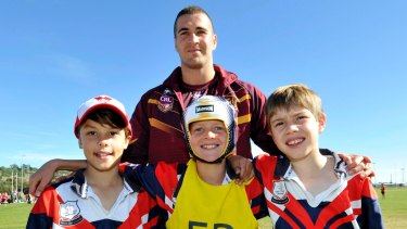 Country and City teams meet and greet:  
Joel Thompson with Mater Dei students (L) Flynn Collins, Xavier McDevitt and Tim Maloney, all 10. 
