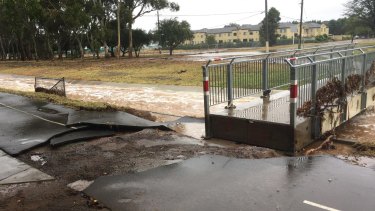Flooding at Dickson oval on Sunday morning.