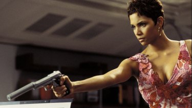 Actress Halle Berry, is shown in a scene from the new James Bond film "Live To Die Another Day" in this undated publicity photograph.  Berry appears in a television special "Bond Girls Are Forever" which features actresses who have been featured as Bond girls in James Bond films.  The special will be telecast on the American Movie Classics cable channel November 6, 2002.   NO SALES  REUTERS/AMC/Handout