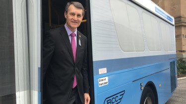Lord Mayor Graham Quirk in one of the 'panther' buses, reflecting Brisbane's 1960s fleet.