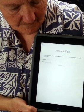 Suzanne McCarthy with her locked ipad purchased at Sydney Airport Auction