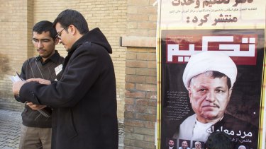 The results suggest that former president Ayatollah Ali Akbar Hashemi Rafsanjani, seen on the right in a magazine cover, may have returned to the centre of power.