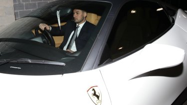 Auburn deputy mayor Salim Mehajer leaves an Auburn council meeting in his white Ferrari. 