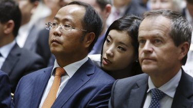 Huang Xiangmo and Opposition Leader Bill Shorten at an event in 2014.