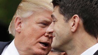 Donald Trump talks with House Speaker Paul Ryan in May