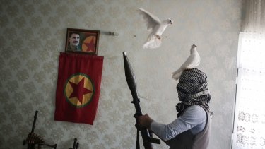 A PKK fighter in a house in the south-eastern Turkish city of Nusaybin in February.