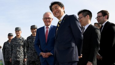 Australian Prime Minister Malcolm Turnbull and Japanese Prime Minister Shinzo Abe inspect the Patriot Missile system and Australian made Bushmaster Protected Mobility vehicle at a Japan Ground Self Defence Force base at Narashino, Japan.