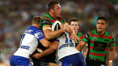 Attracting attention: Rabbitohs forward Sam Burgess tackled during last year's grand final.