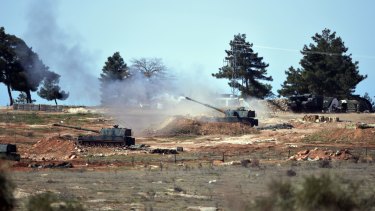 Turkish artillery fire from the border near the town of Kilis towards northern Syria in February.
