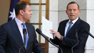 Warning shot on energy: former prime minister Tony Abbott, pictured with then-assistant treasurer Josh Frydenberg at Parliament House in March 2015. 