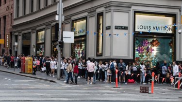 Large queues outside the Louis Vuitton Store on Pitt St, Sydney.