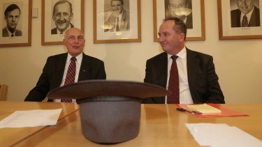 If the hat fits... outgoing Deputy Prime Minister Warren Truss and his replacement Barnaby Joyce.