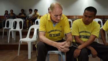 Peter Scully inside the Cagayan De Oro court handcuffed to another inmate on his first day of his trial.