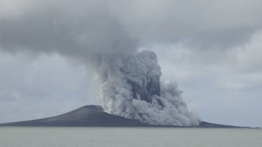 A volcano that has been erupting for several weeks near Tonga has created a new island in the ocean. This photo was taken on January 14.