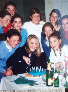 Bee Alexander, far left in middle row, at a surprise party for Katrina Dawson who is cutting the cake on her 15th or 16th birthday.