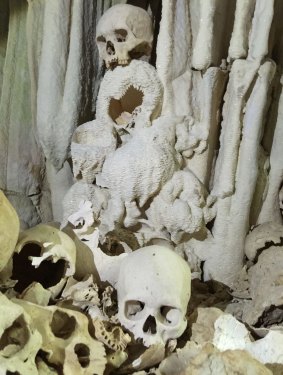 The skulls in this mountain cave are thought to 300 years old.