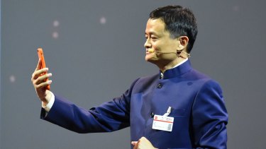 Pay by selfie: The founder and executive chairman of Chinese e-commerce company Alibaba Group, Jack Ma, demonstrates the new facial recognition technology.