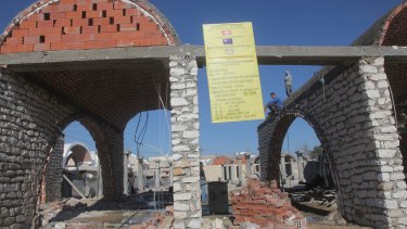 A sign shows that the new market building in Sidi Bouzid is a joint Tunisian-EU project.