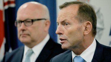 Prime Minister Tony Abbott with Attorney-General George Brandis.