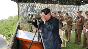 North Korean leader Kim Jong-Un inspecting a firing contest of artillery personnel in an undated picture released from North Korea's official Korean Central News Agency.