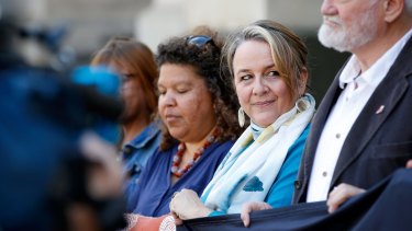 ''I'm absolutely elated'': Dimity Hawkins (second right), one of the founders of the ICAN, on the steps of Parliament House in Melbourne on Sunday.