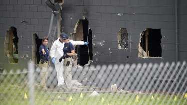 Huge holes were blown out of the side of the nightclub by police during the shooting. 