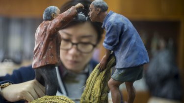 Clay figures are created to promote traditional Chinese values in Tianjin.