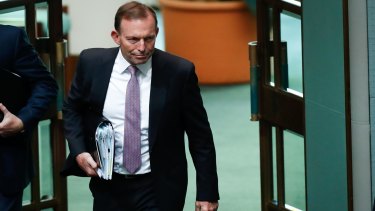 Former prime minister Tony Abbott arrives for Question Time at Parliament House in Canberra.