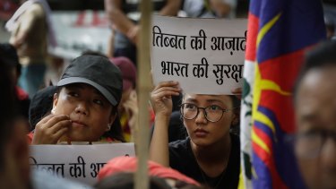 Exile Tibetans in New Delhi join a protest to show support for India in Doklam stand-off.