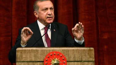 President Recep Tayyip Erdogan gives a speech commemorating those killed and wounded during the failed coup.