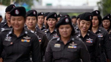 Police officers deploy outside the Thai Supreme Court ahead of ascheduled  verdict on charges accusing former Prime Minister Yingluck Shinawatra of negligence in implementing a rice subsidy.