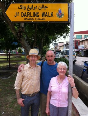 In Malaysia in 2012 with Mary and brother Tom in a street named after his grandfather Tommy Darling, a member of the British Colonial Service. 