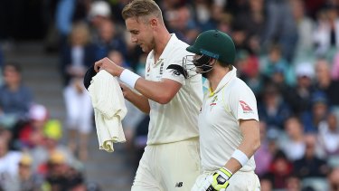 Steve Smith has words with Stuart Broad at the end of his over in Adelaide.
