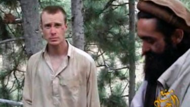 A frame grab from a 2010 video released by the Taliban showing Bowe Bergdahl with one of his Afghan captors.