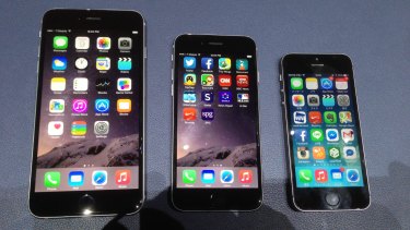 The Apple iPhone 6 Plus and 6, next to the iPhone 5S.