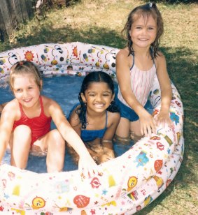 Vimala, age four, with friends in her Sydney backyard.