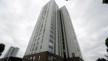 Burnham residential tower on the Chalcots Estate showing the bottom brick section of the building after cladding was removed due to safety concerns.