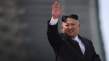 North Korean leader Kim Jong-un waves during a military parade in Pyongyang, North Korea earlier this year. China fears his antics may drive a rise in desertions.