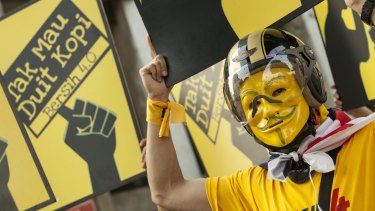 A masked anti-government protester during the Bersih (Clean) 4.0 rally in Kuala Lumpur, Malaysia in August last year.