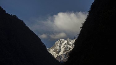 Mountain peaks are seen near  the 7,556 m ft) Mount Gongga, known in Tibetan as Minya Konka on November 13, 2015 in Hailuogou, Garze Tibetan Autonomous Prefecture, Sichuan province.
