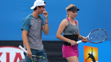 Caught in the middle: Thanasi Kokkinakis and Donna Vekic at the 2014 Australian Open.