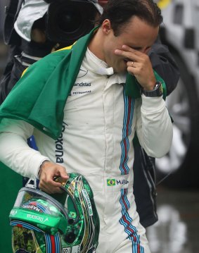 An emotional Massa after crashing out of his last Brazilian grand prix.