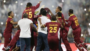 West Indies players celebrate after defeating England in the final of the ICC World Twenty20 tournament at Eden Gardens in Kolkata on Sunday.