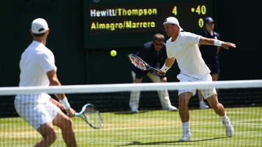 Evergreen: Lleyton Hewitt plays a forehand with Jordan Thompson during the men's doubles first round match against Nicolas Almegaro and David Maarrero.