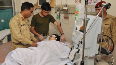 Army doctors treat Malala after she was shot in 2012.
