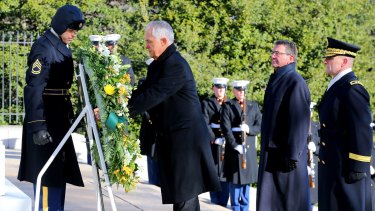 Mr Turnbull lays a wreath at the tomb of the Unknowns at Arlington War Cemetery in Virginia.