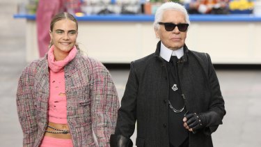 With Karl Lagerfeld presenting a Chanel collection, Paris, 2014.